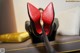 A pair of red high heels sitting on top of a table.